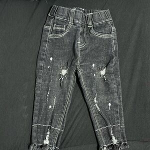 Black tie dye style jeans